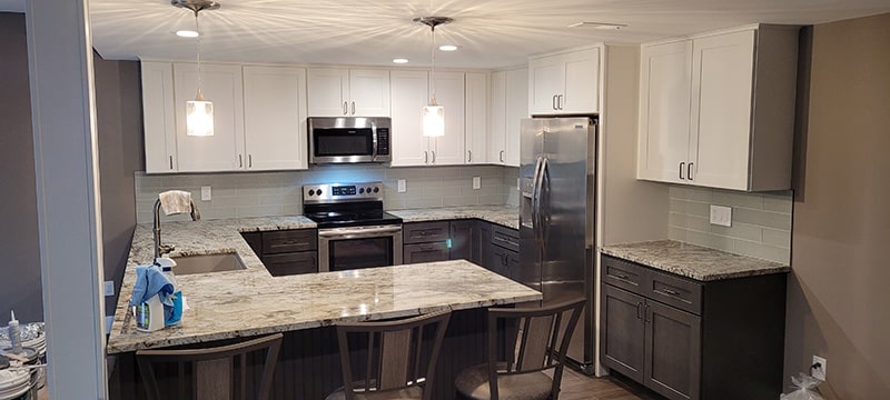 Image of a secondary kitchen in a renovated basement by Kaier Property Management.