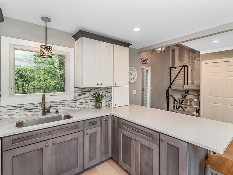 Image of two-toned cabinets, a part of a kitchen renovation completed by KPM.